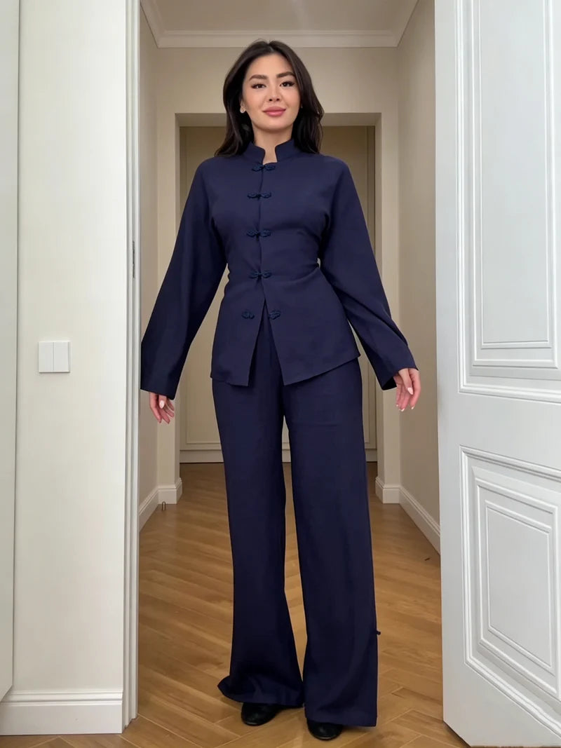 Navy linen co-ord set with buttoned jacket and wide-leg trousers, standing full body.