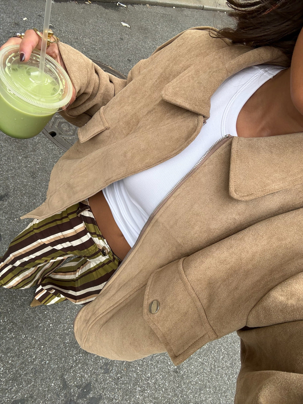 Tan suede bomber jacket with button front, folded collar, and front pockets