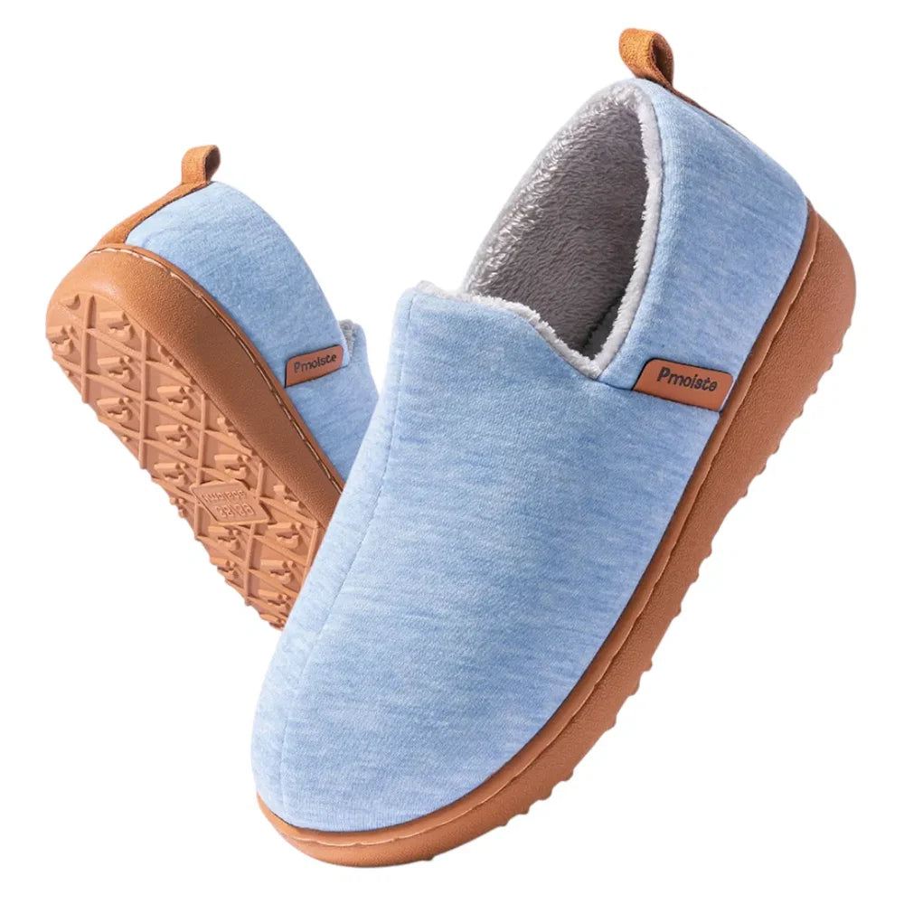 Blue fleece-lined slip-on house slipper with tan outsole and side tag