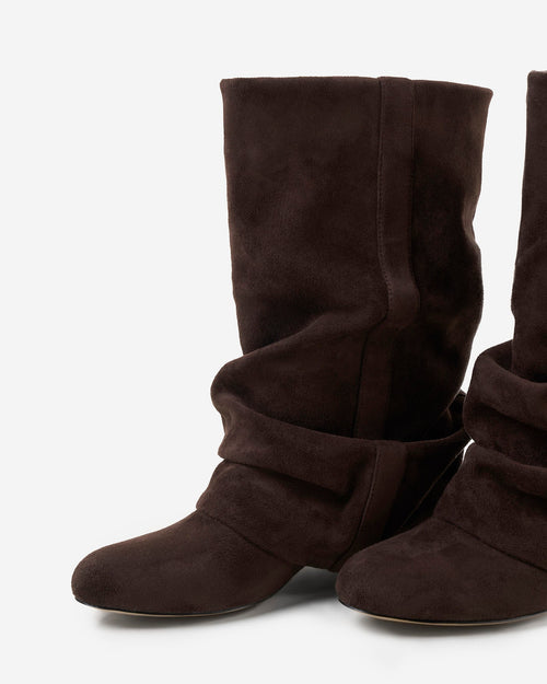 Brown slouchy knee-high suede boots, angled side view