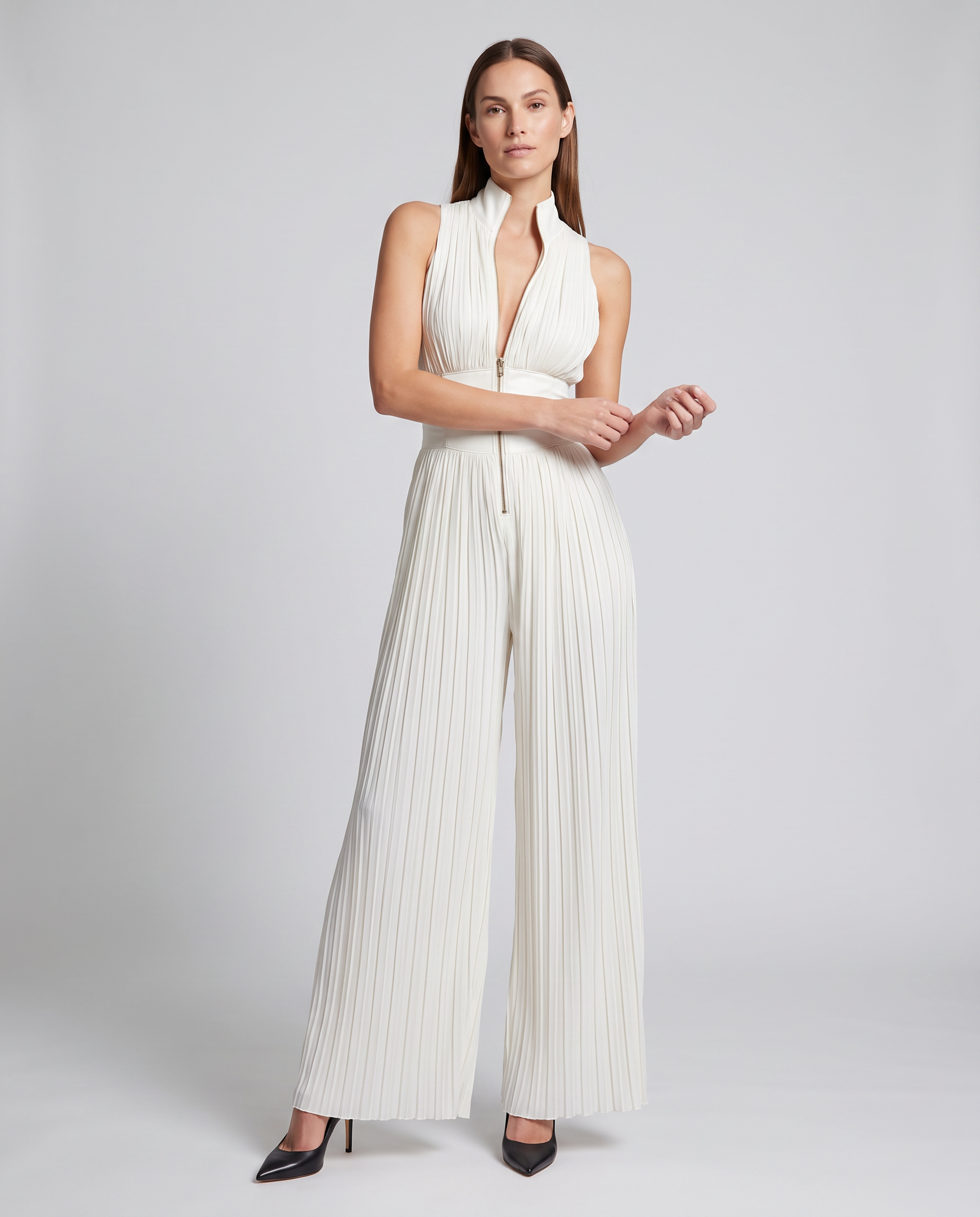 White pleated wide-leg sleeveless jumpsuit with V-neck and drawstring waist