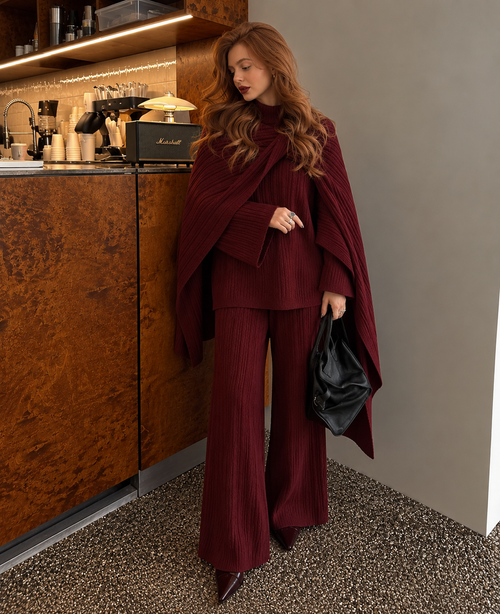 Burgundy knitted three-piece sweater set with ribbed top, wrap cardigan, and wide-leg pants