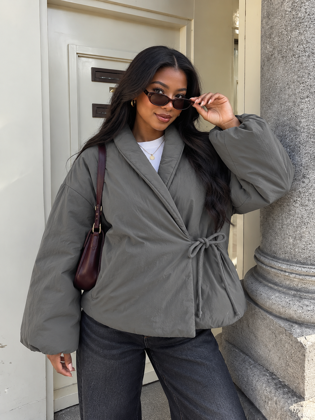 Gray padded wrap jacket with kimono collar and knotted waist tie