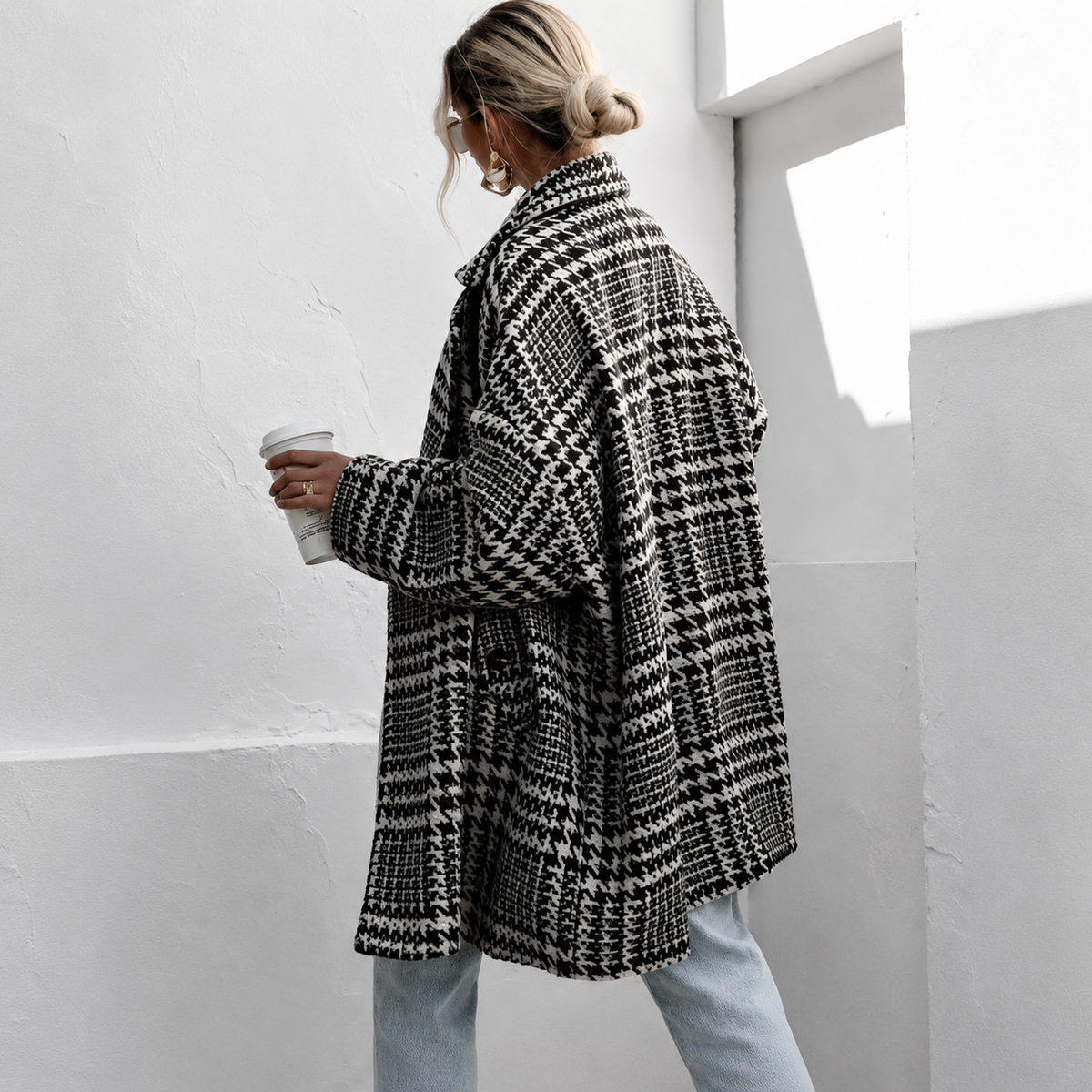 Double-breasted houndstooth wool coat with textured plaid pattern, knee-length