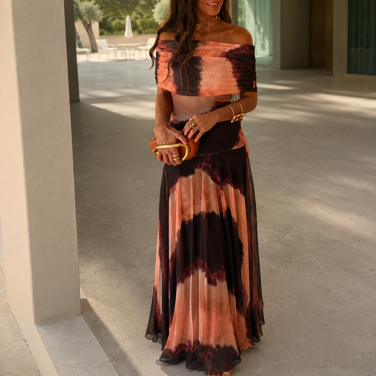 Burnt orange tie-dye one-shoulder sheath maxi dress with ruched bodice and sheer skirt