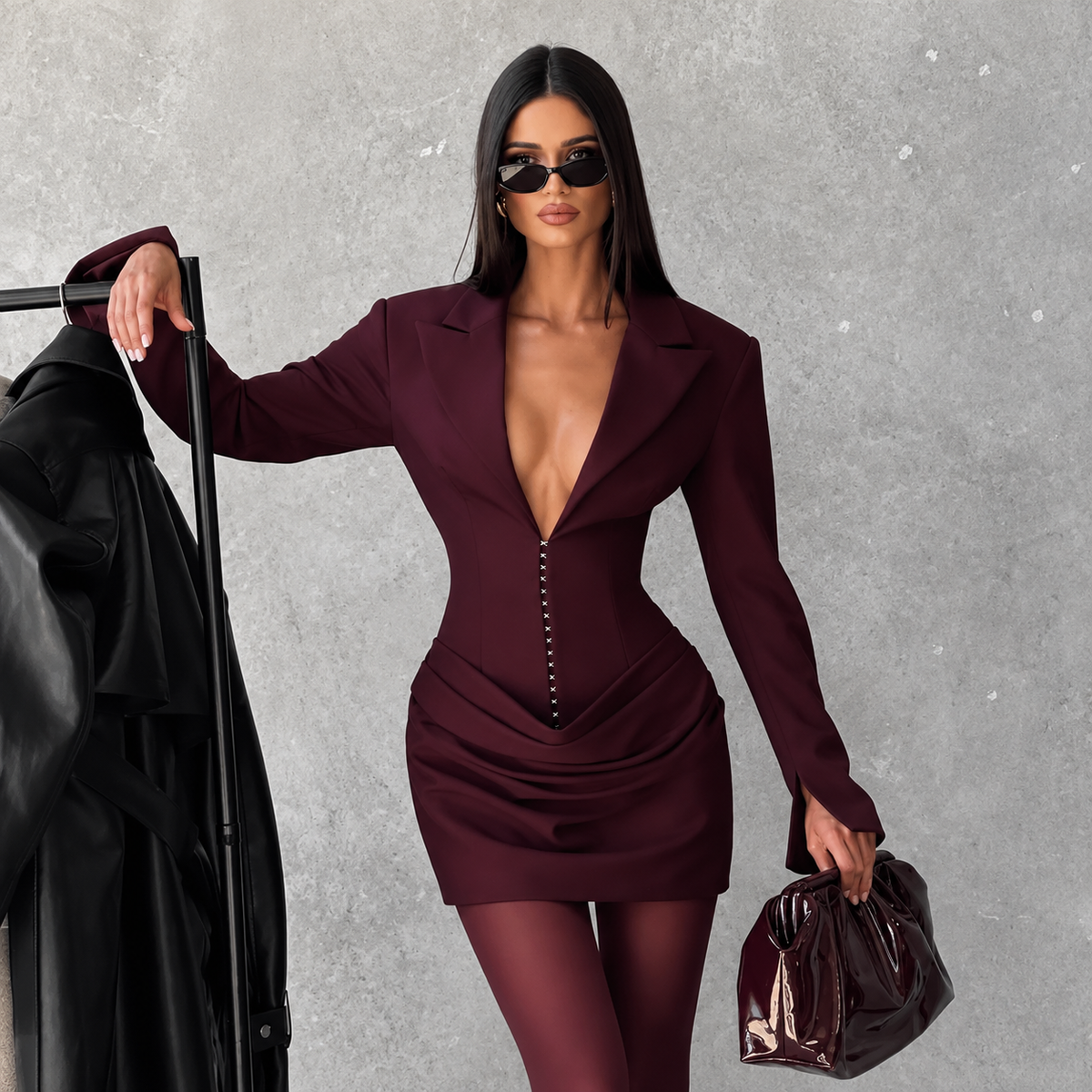 Wine pleated blazer mini dress with deep V-neck and ruched waist detail