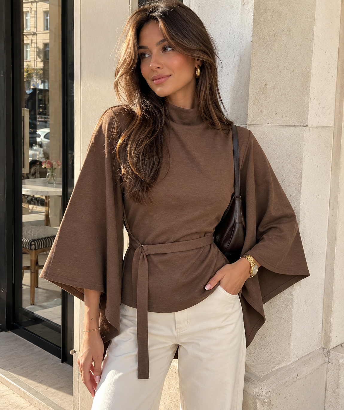 Brown knit batwing shoulder-wrap top with high neck and waist tie belt