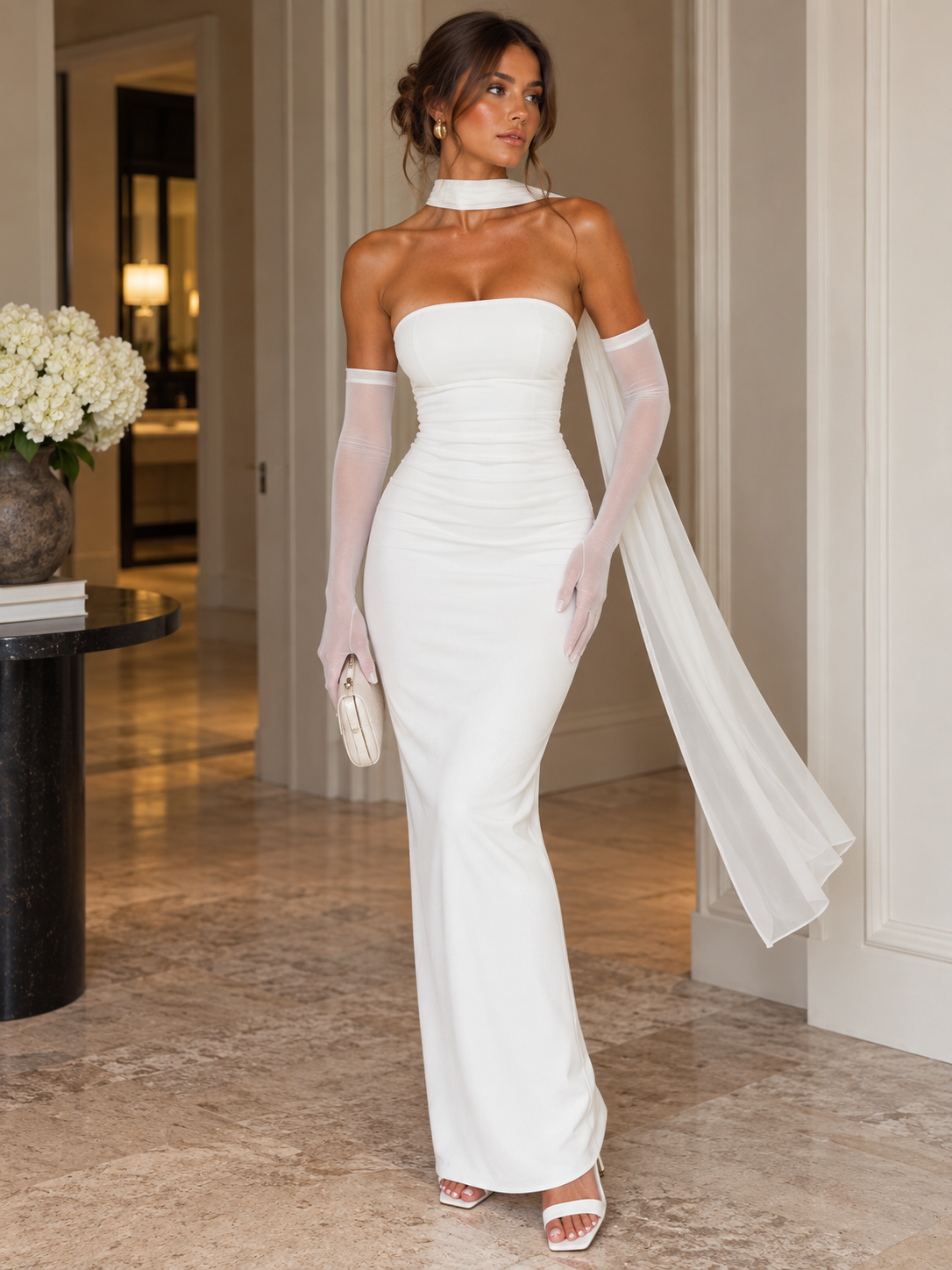 White strapless maxi bodycon gown with sheer scarf mesh drape and long gloves