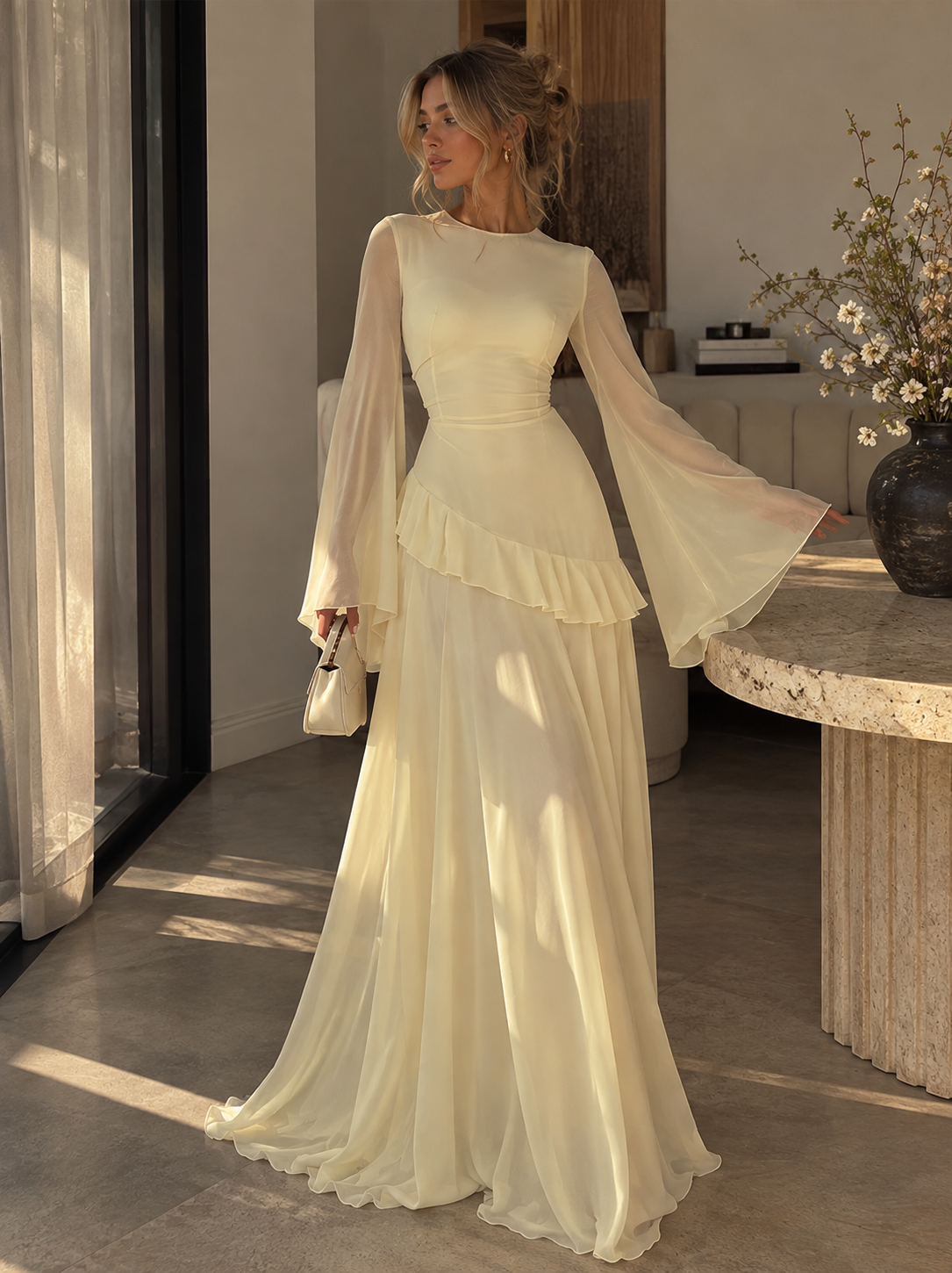 Light yellow tiered maxi dress with long bell sleeves and layered ruffle skirt