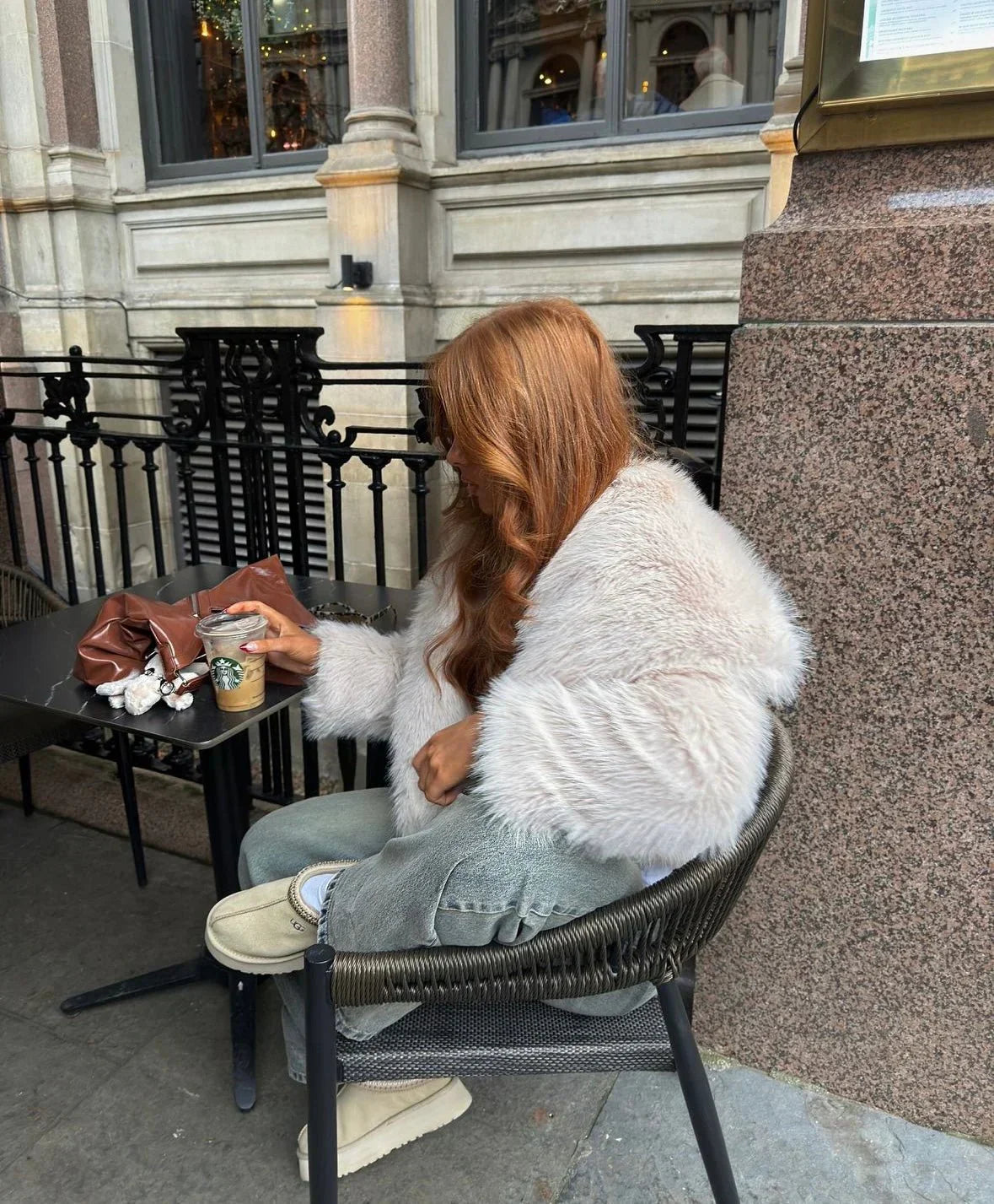 Light grey oversized faux fur coat with plush sleeves and open front