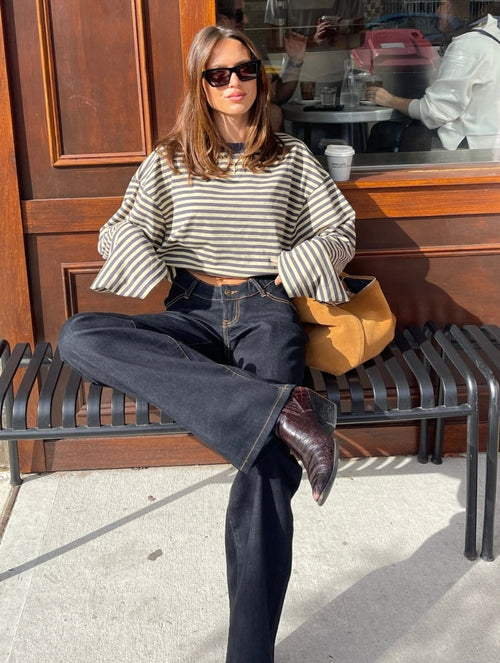 Women’s striped oversized knit sweater, black and white, loose fit with wide cuffs