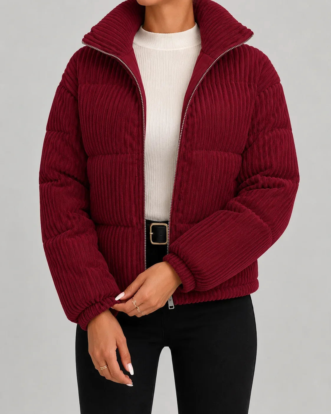 Burgundy corduroy puffer jacket with full zip front, stand collar, and ribbed cuffs.