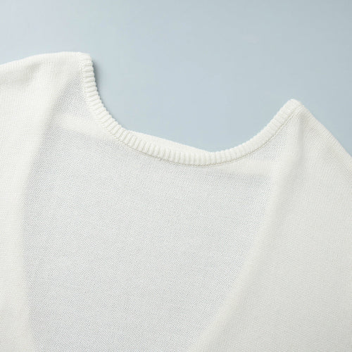 Off-white knit sweater crew neck, ribbed collar with fine knit texture