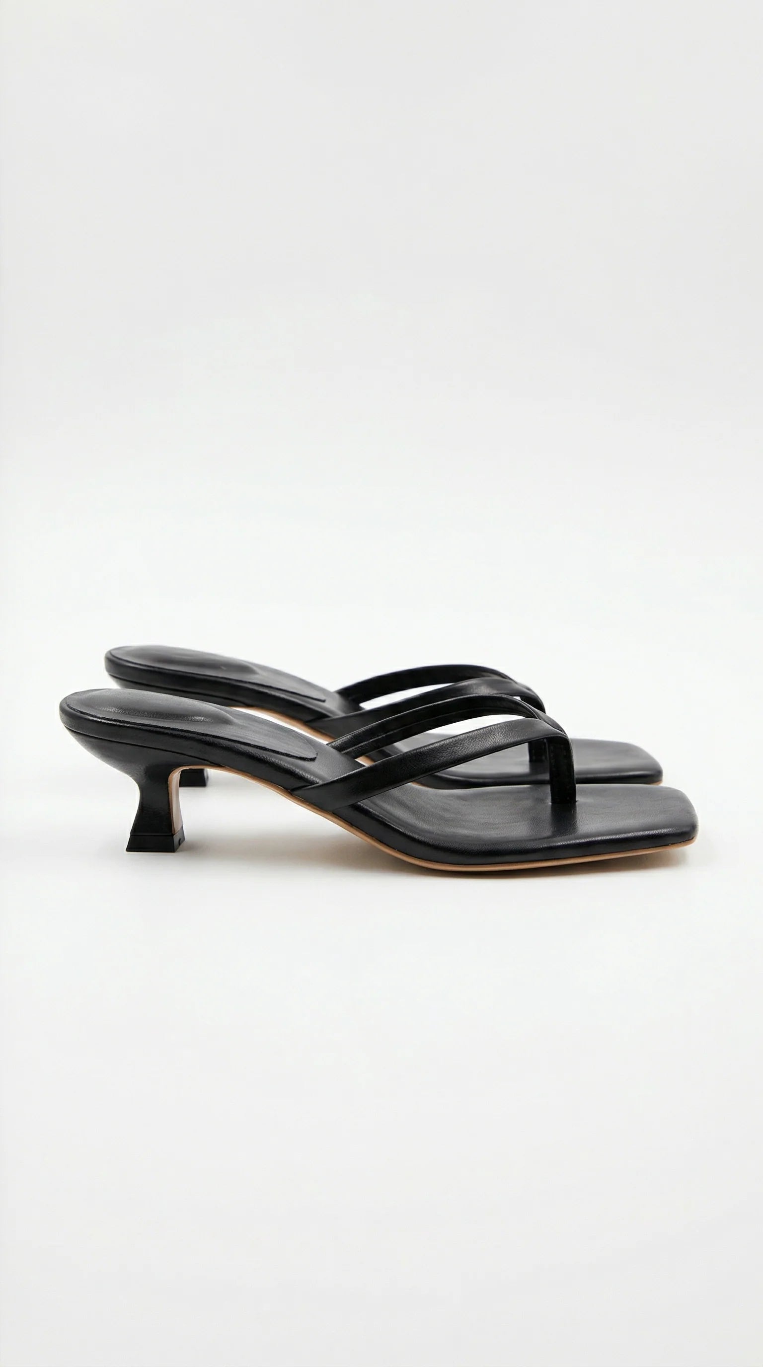 Amélie strappy kitten heel mule in black, side view