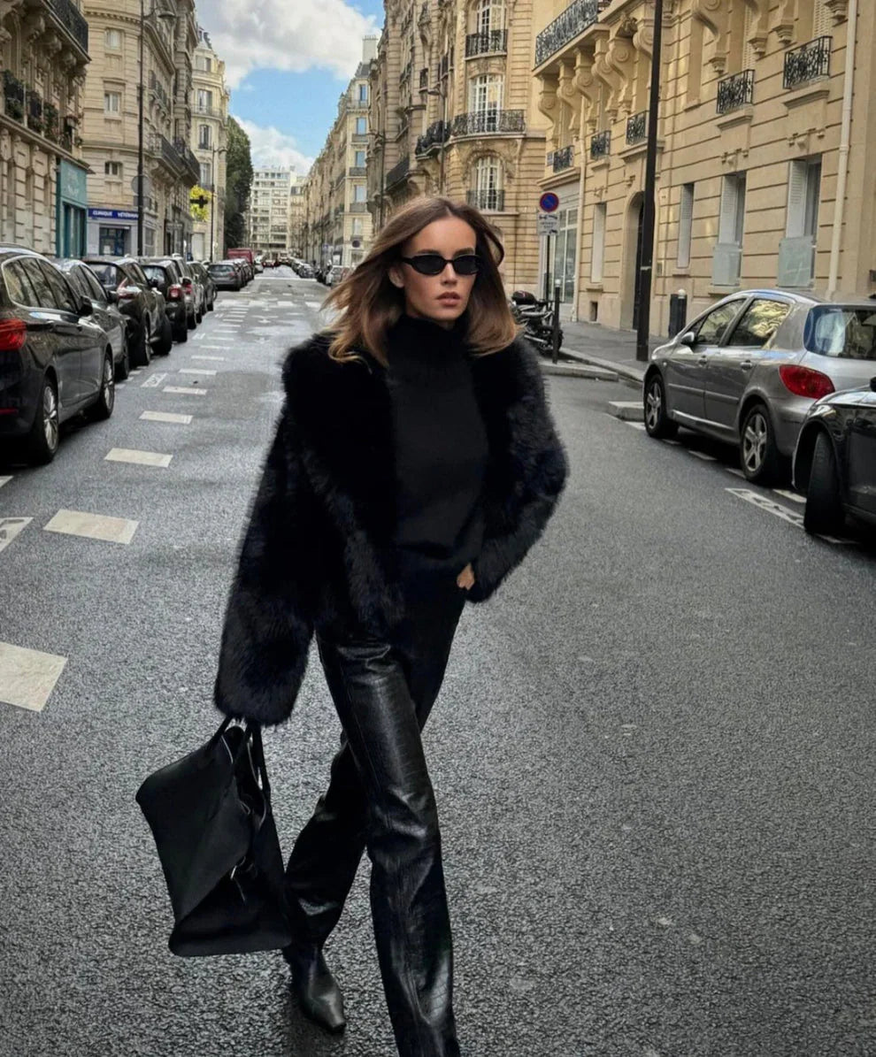 Black oversized faux fur coat with open front and fluffy sleeves