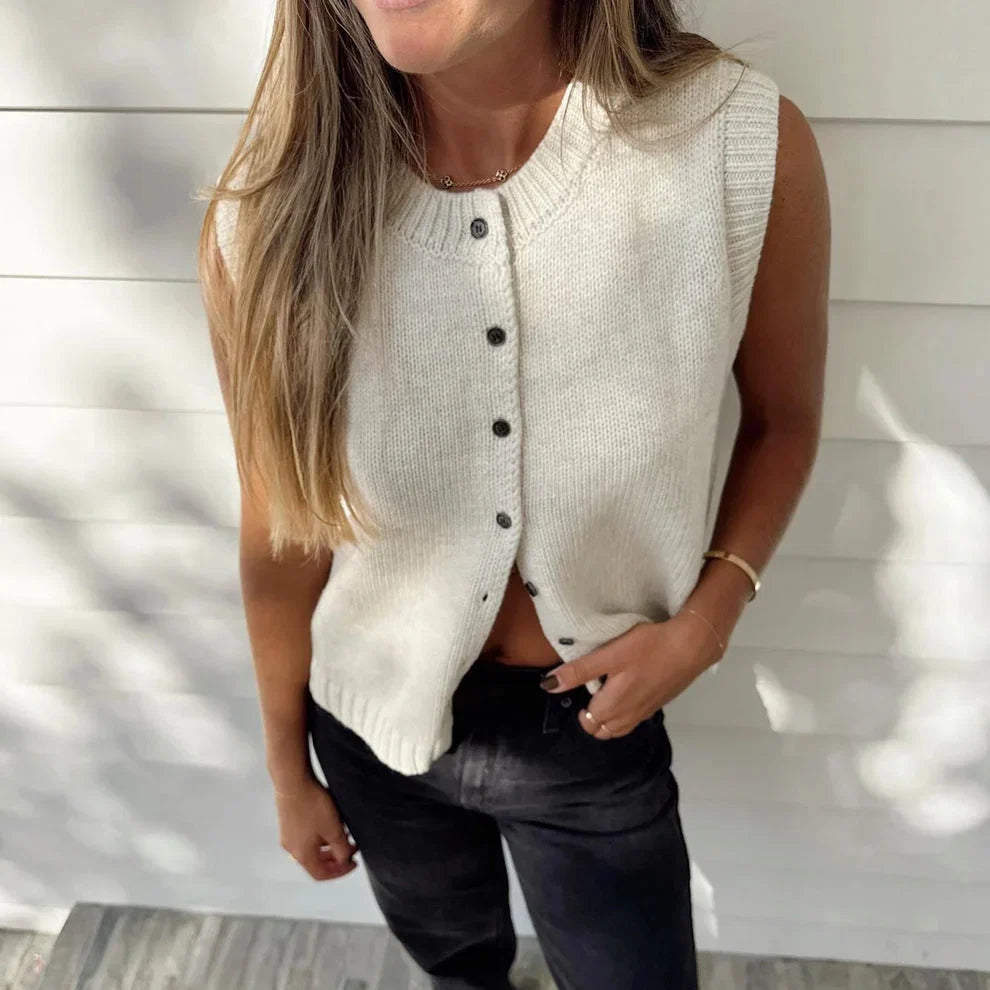 Women’s knitted button-front vest cardigan in off-white, sleeveless with button placket