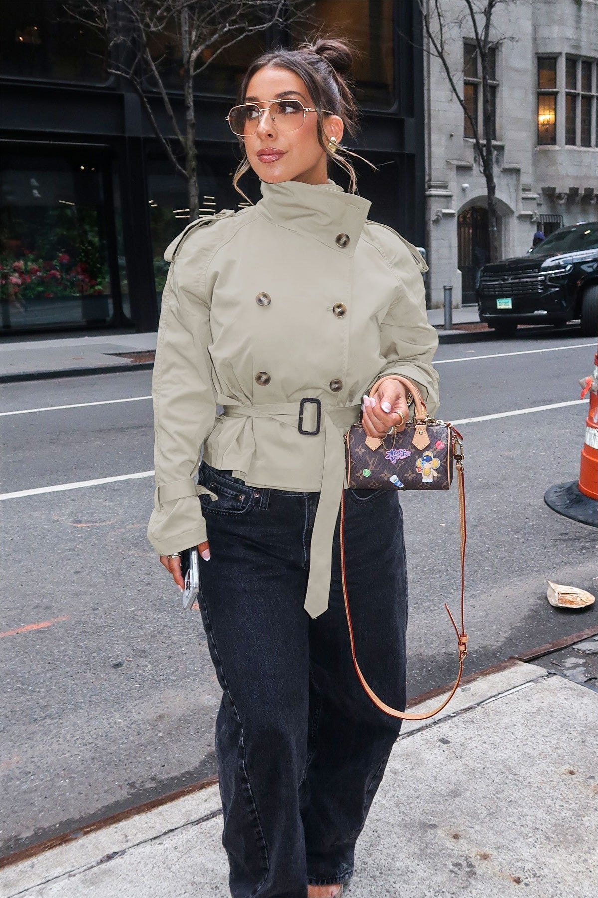 Khaki belted high-neck trench coat with double row buttons and neat collar