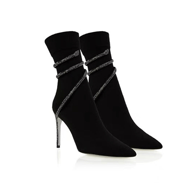 Black ankle boots with rhinestone wrap straps and slim stiletto heels