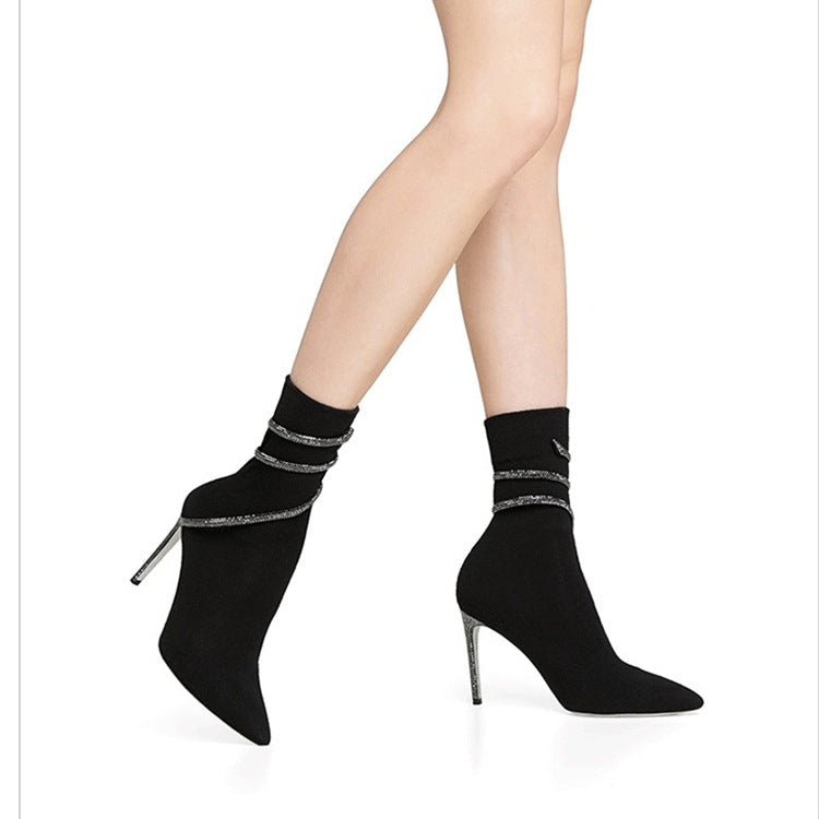 Black suede ankle boots with rhinestone wrap straps and stiletto heel