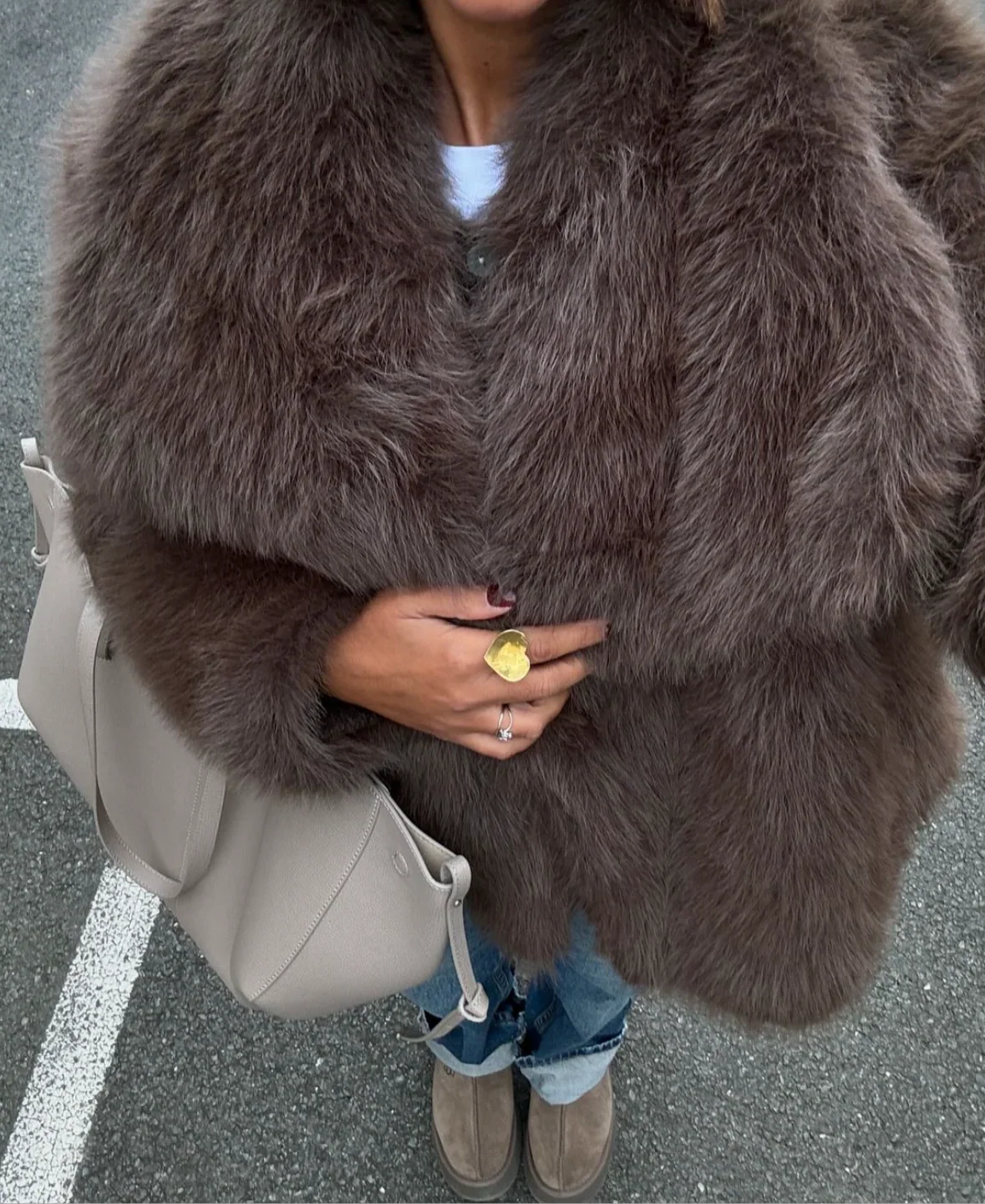Brown oversized faux fur coat with wide collar, button-front, long sleeves