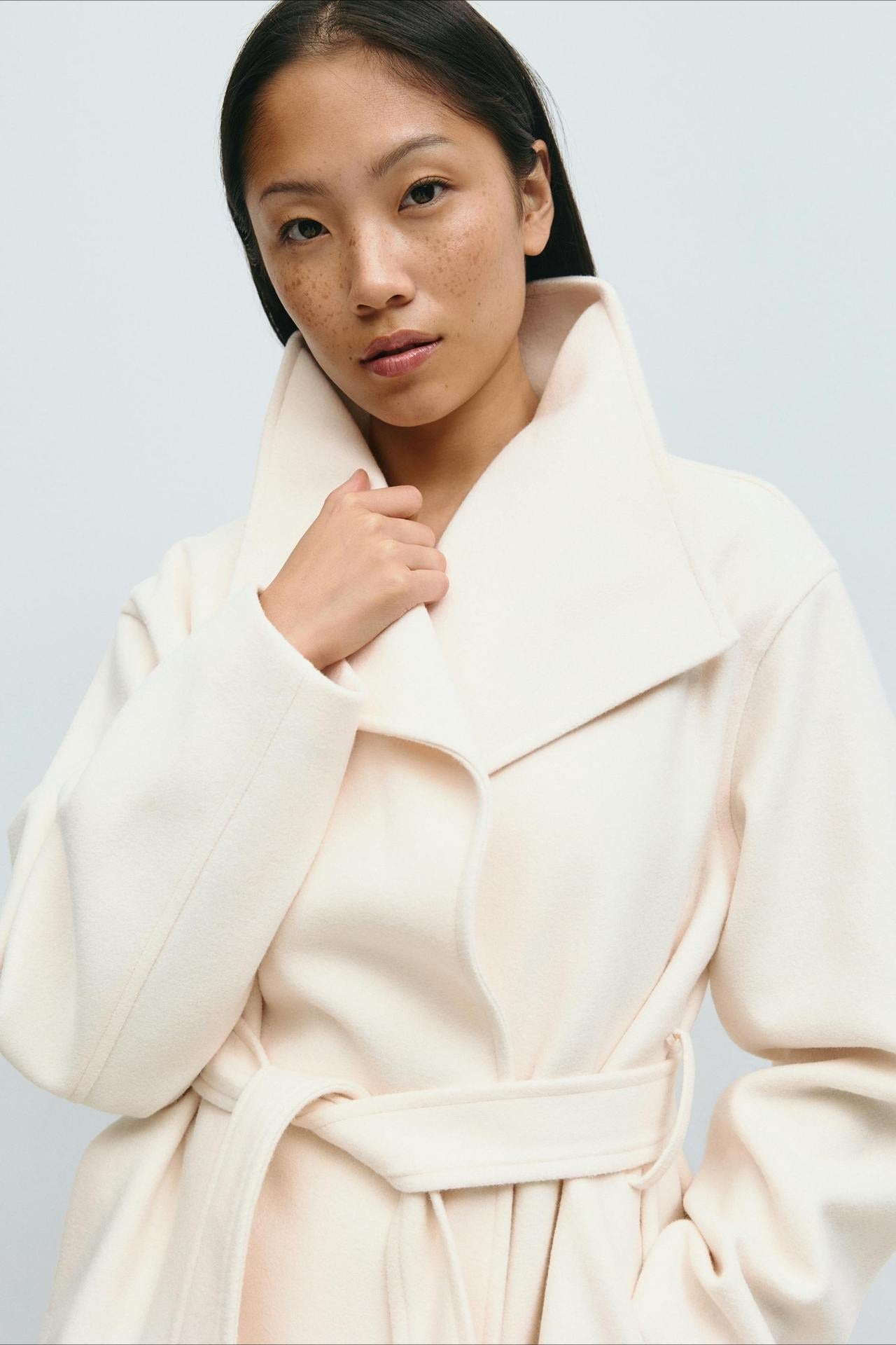 Cream belted wrap jacket coat with high neck and long sleeves