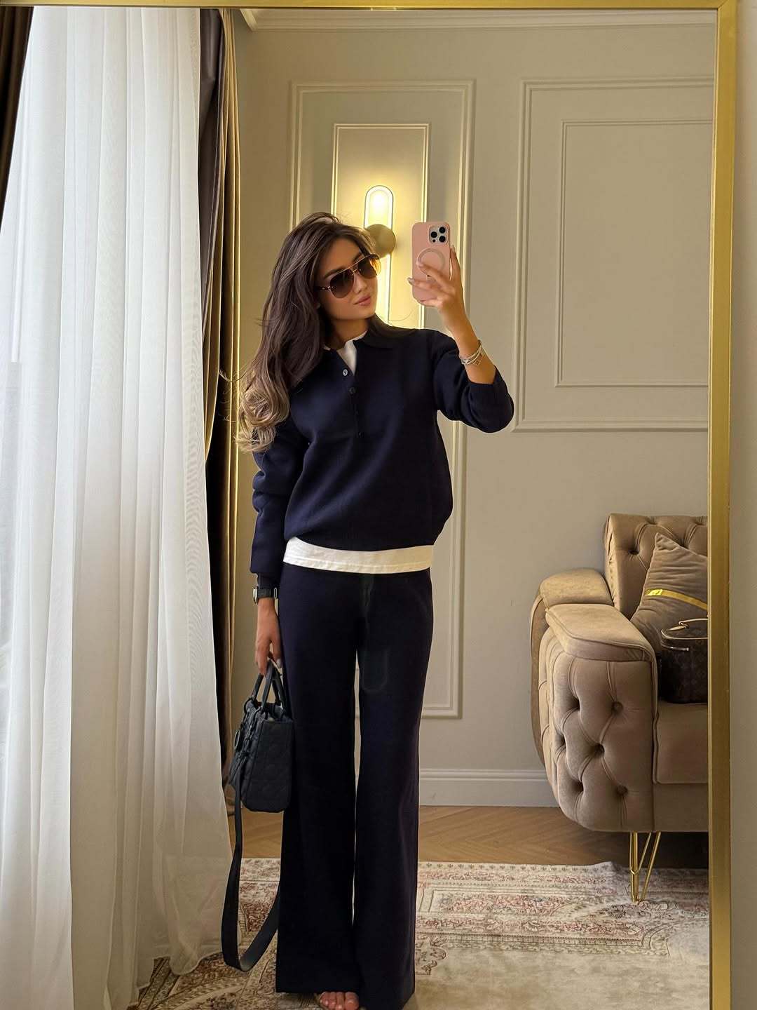 Navy knit two-piece set with polo collar top and wide-leg pants