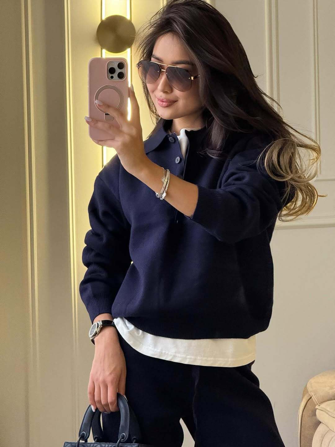 Navy knit polo-collar top with long sleeves and matching wide-leg pants
