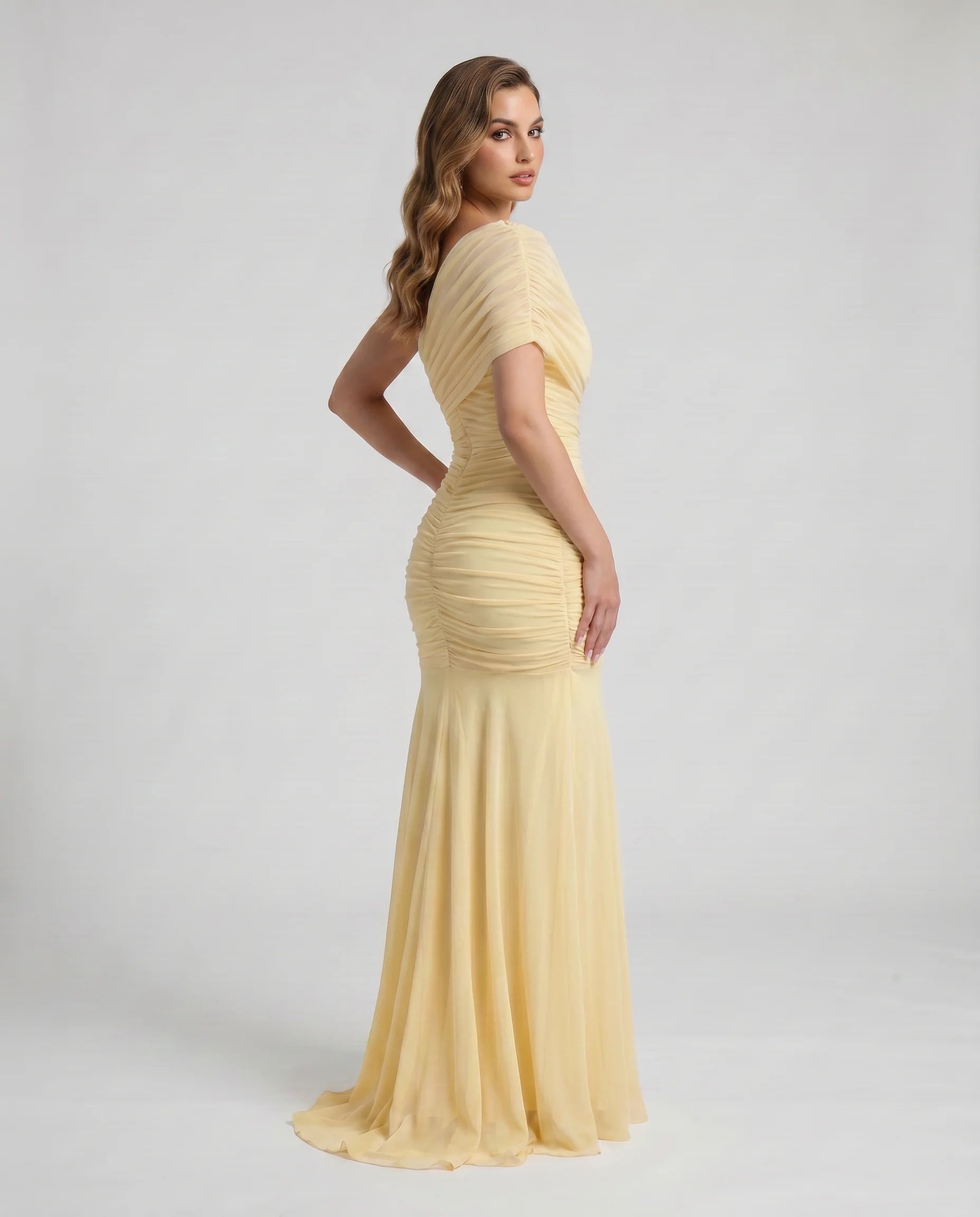Yellow ruched mermaid maxi dress with short draped sleeves, fitted silhouette, flared skirt
