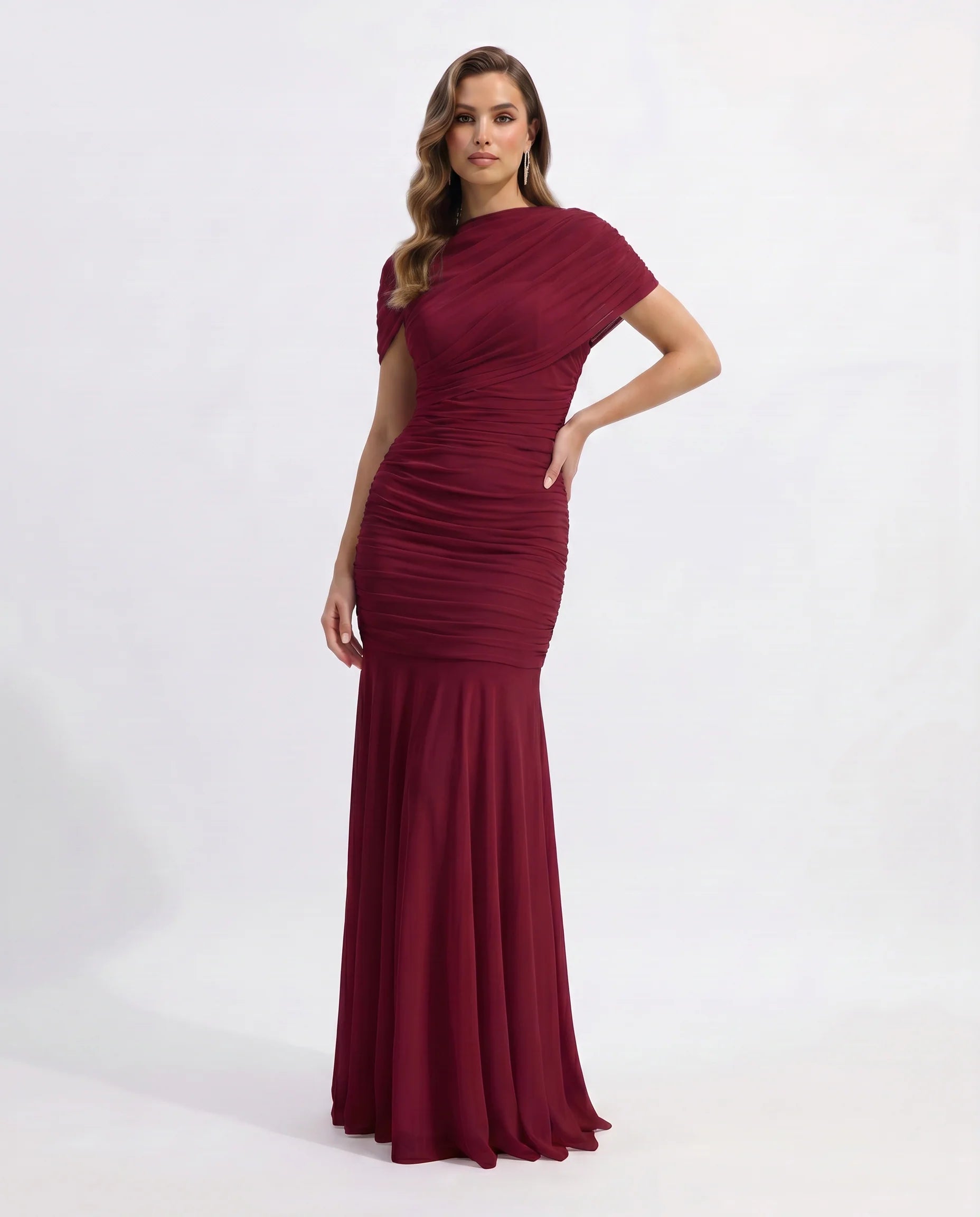 Burgundy ruched mermaid maxi dress with draped shoulder detail and flared long skirt