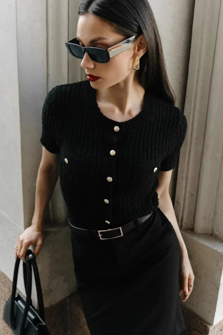 Black textured knit button-front short sleeve cardigan with gold-tone buttons