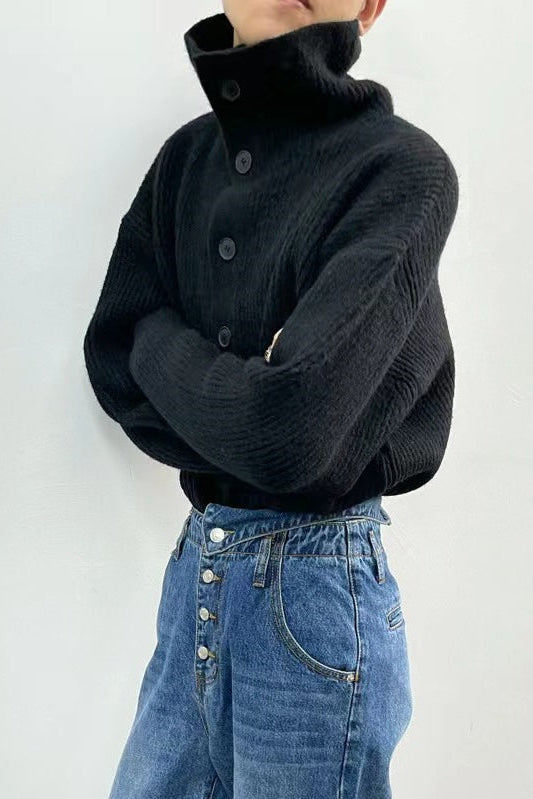 Black ribbed knit cardigan with high neck and button front, long sleeves