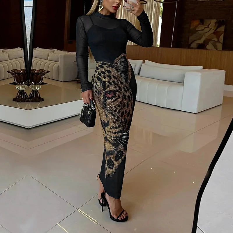 Black mesh long-sleeve dress with leopard-print rhinestone front and fringed panel