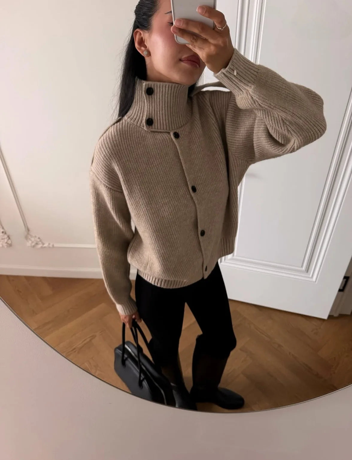 Beige/brown ribbed knit turtleneck cardigan with loose sleeves and button front