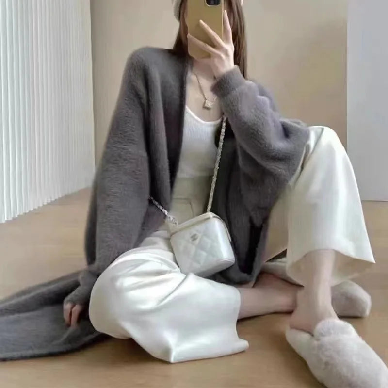 Gray faux-mink open coat with long sleeves, relaxed fit, knee-length