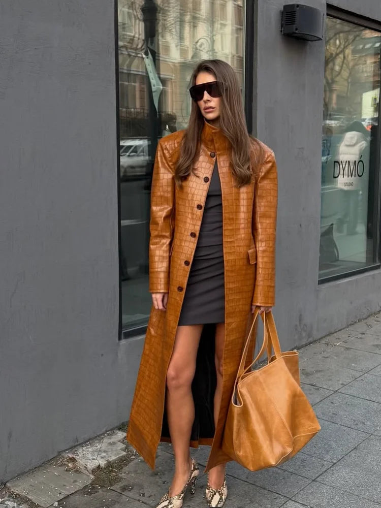 Mustard croc-embossed faux leather trench coat with double-breasted button front