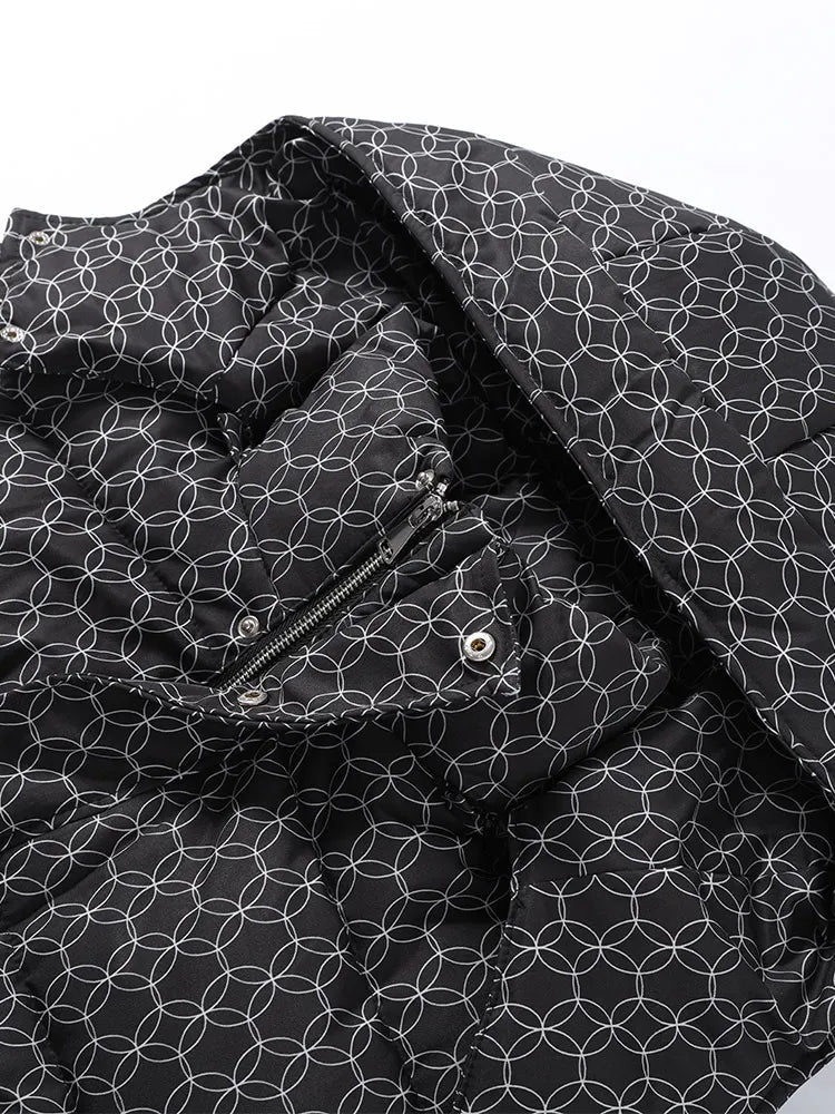 Quilted puffer jacket in dark fabric with circular print, zip front and hood