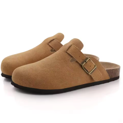 Suede buckle clog in tan-brown with metal buckle strap and dark rubber outsole.