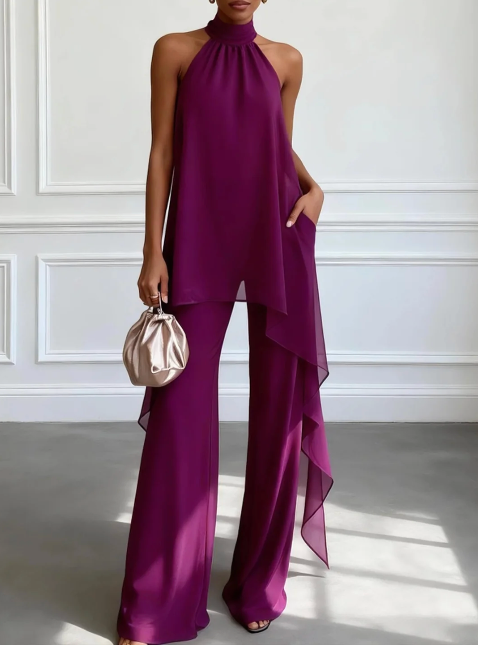 Purple halter co-ord set with draped overlay top and wide-leg trousers, asymmetric hem