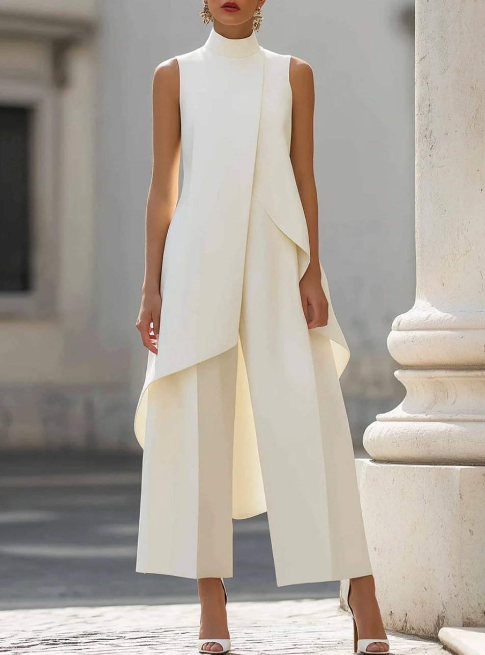 White high-neck wide-leg co-ord set: sleeveless draped top and wide-leg trousers.