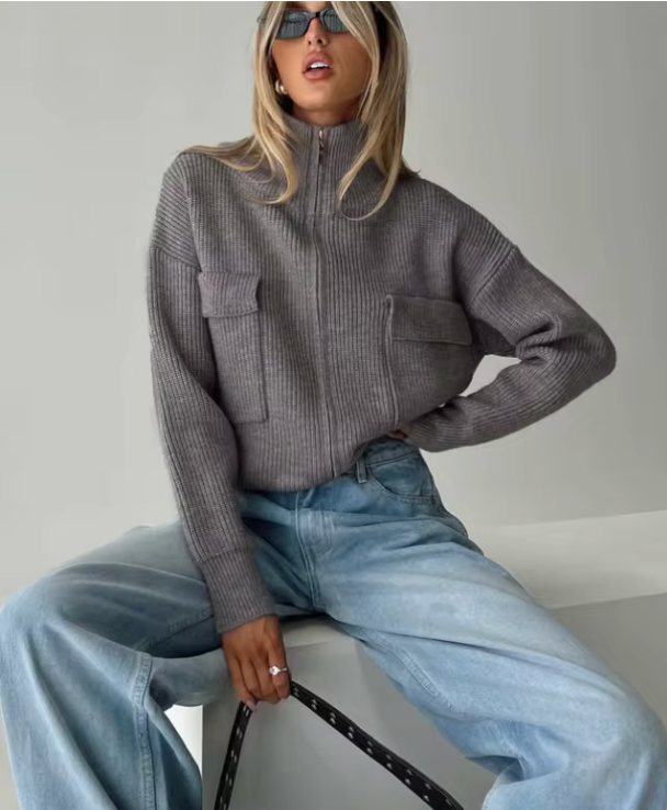 Grey funnel-neck zip-up knit sweater with two chest pockets and long sleeves