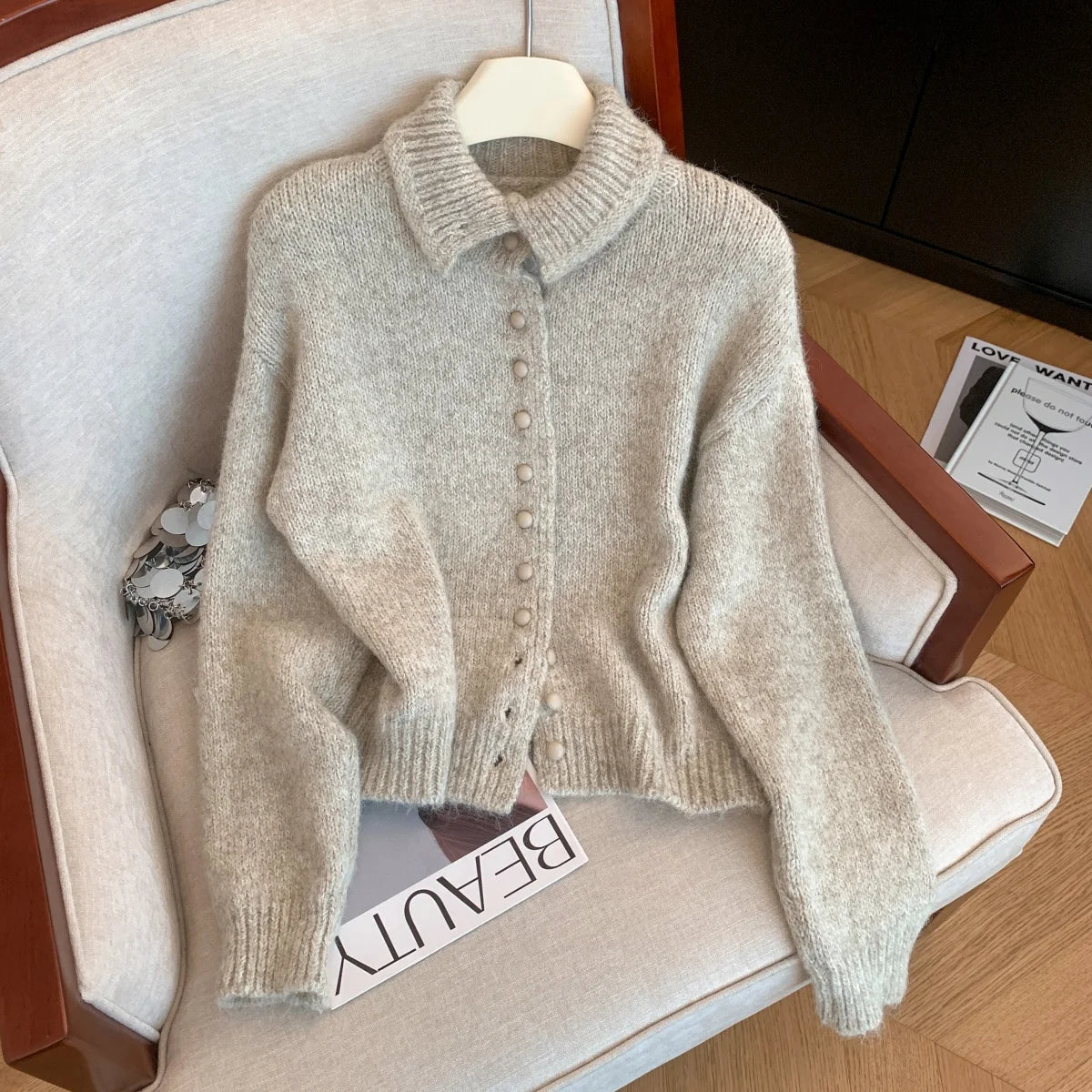 Light beige knit turtleneck jumper with button placket and long sleeves