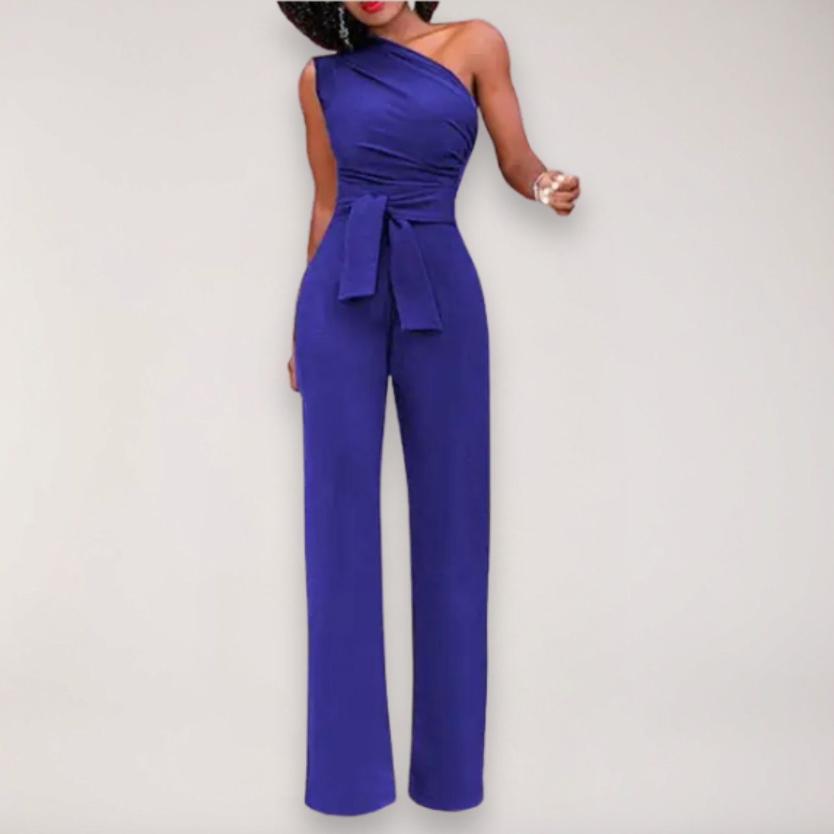 Blue one-shoulder draped jumpsuit with tie waist and wide-leg pants