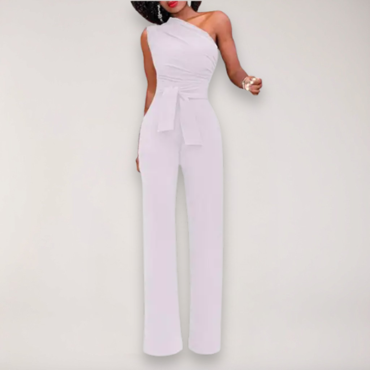 White one-shoulder draped jumpsuit with tie waist and wide-leg pants