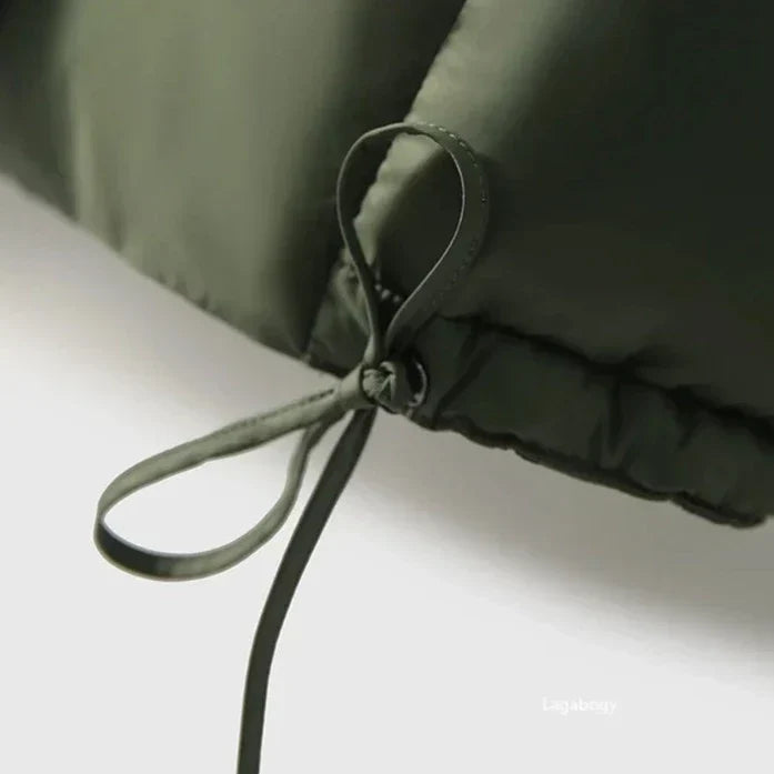 Green down puffer coat drawstring with toggle at coat hem