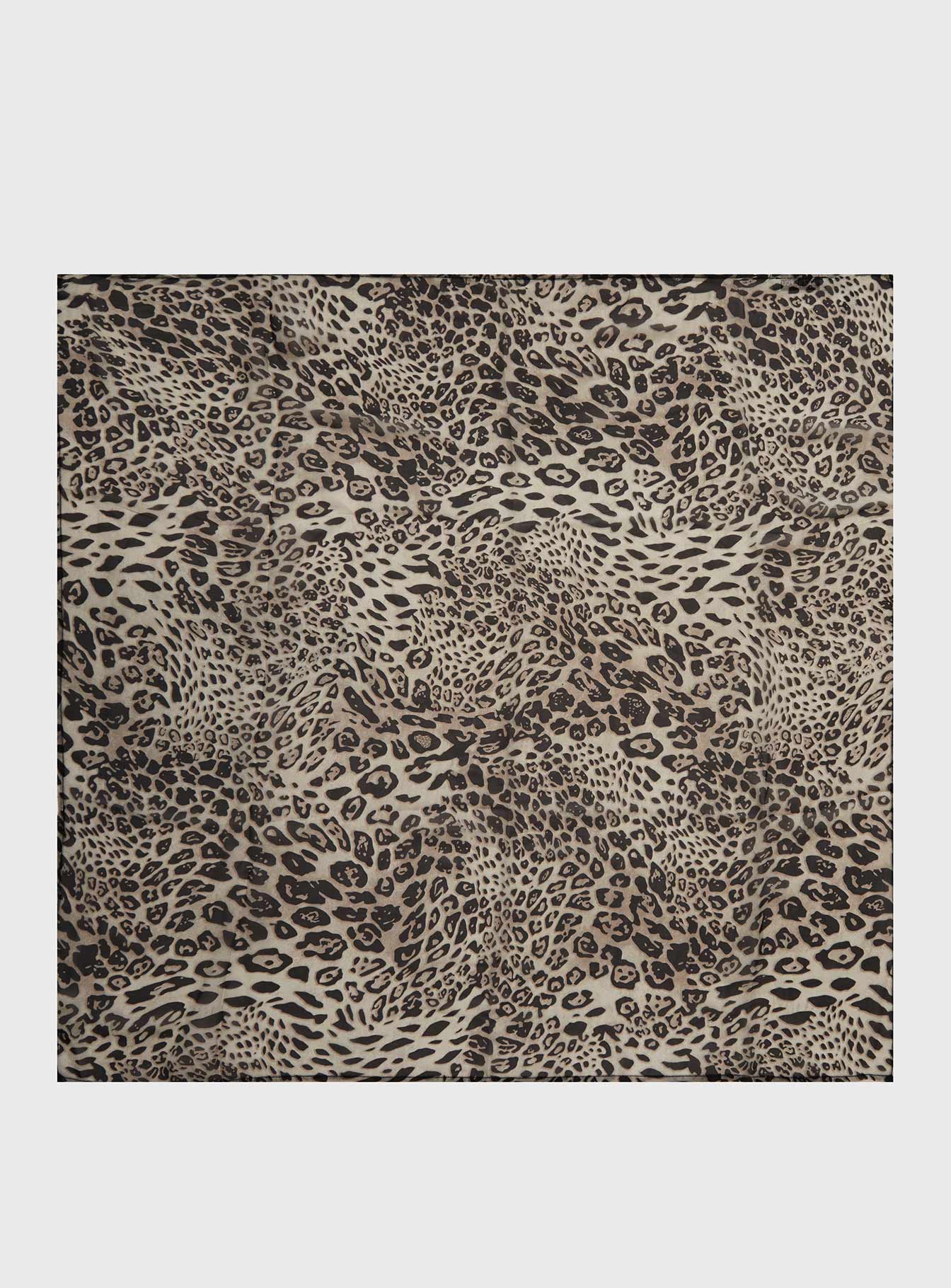 Leopard-print satin scarf in beige and black, neatly laid flat.