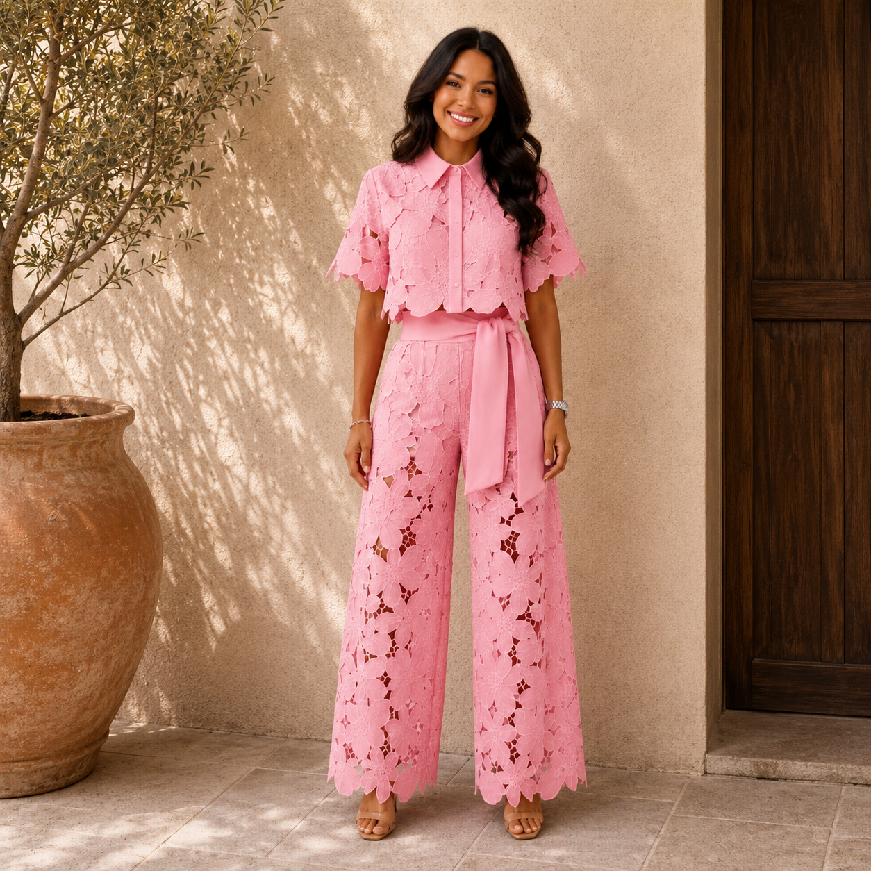 Pink lace two-piece set: short-sleeve blouse and wide-leg pants with waist tie.