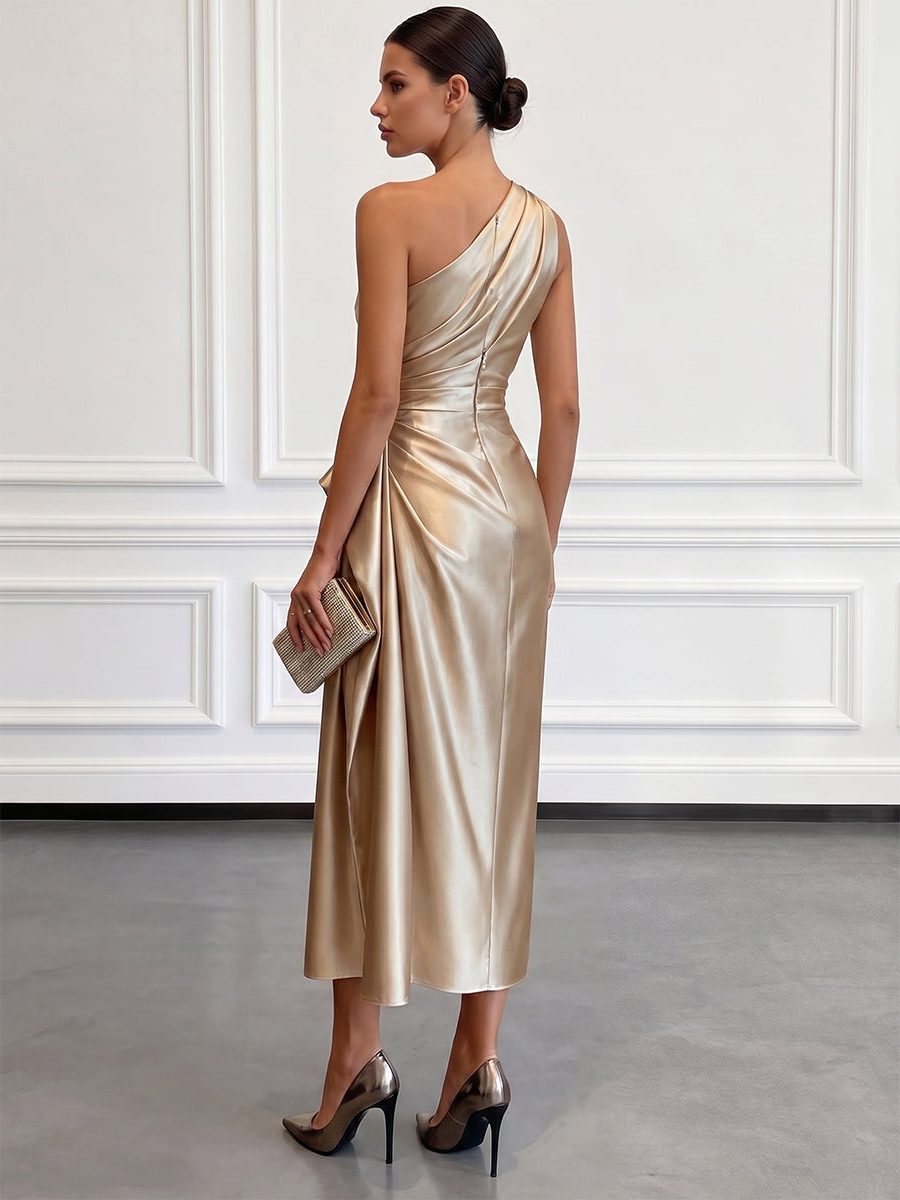 One-shoulder ruched midi dress in gold satin with draped side wrap