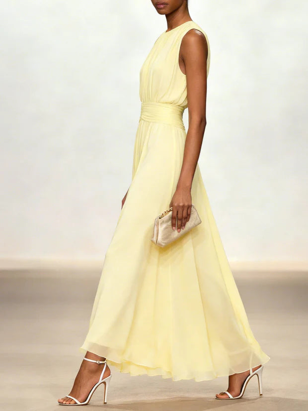 Light yellow sleeveless maxi A-line dress with ruched bodice and gathered waist