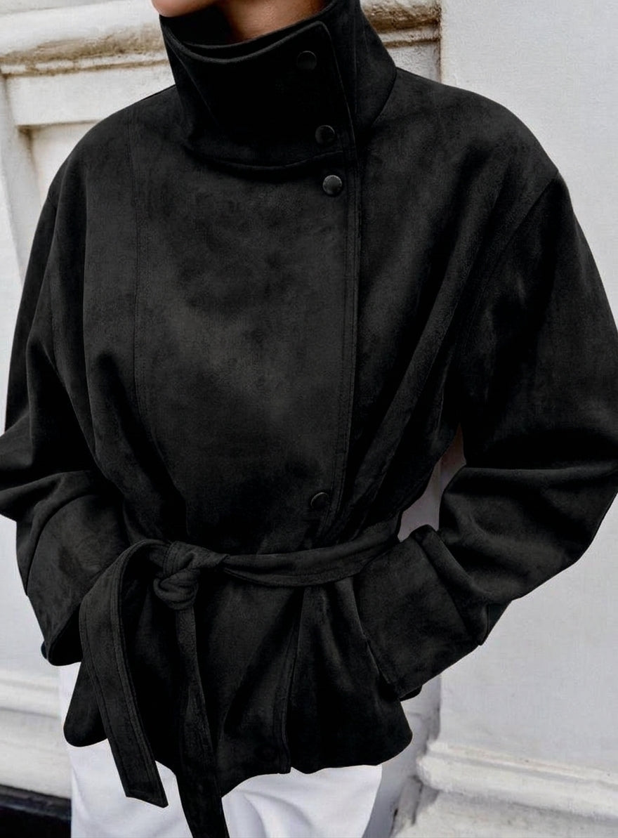 Black suede jacket with high collar, button front, and tied waist belt