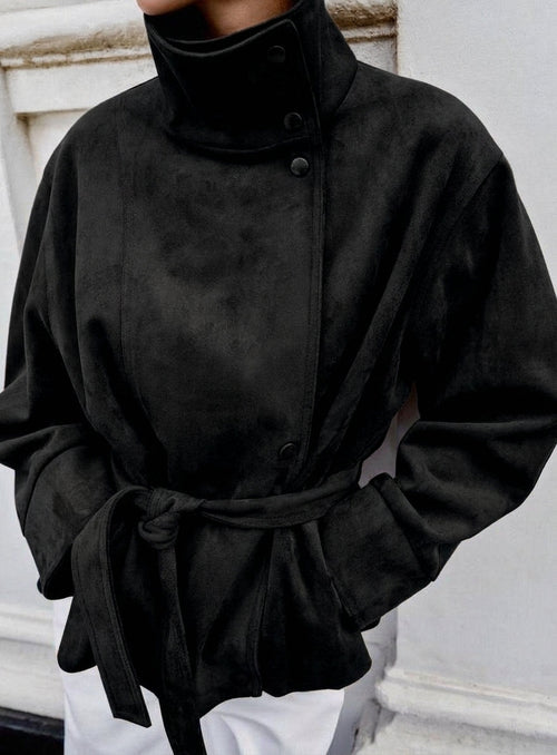 Black suede jacket with high collar, button front, and tied waist belt
